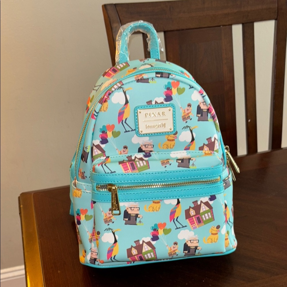 Loungefly Pixar Up Blue Mini Backpack with Multi-color Accents